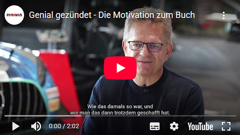 Videovorschaubild mit Roalnd Arnold sitzend vor einem Auto und dem Youtube Abspiellogo